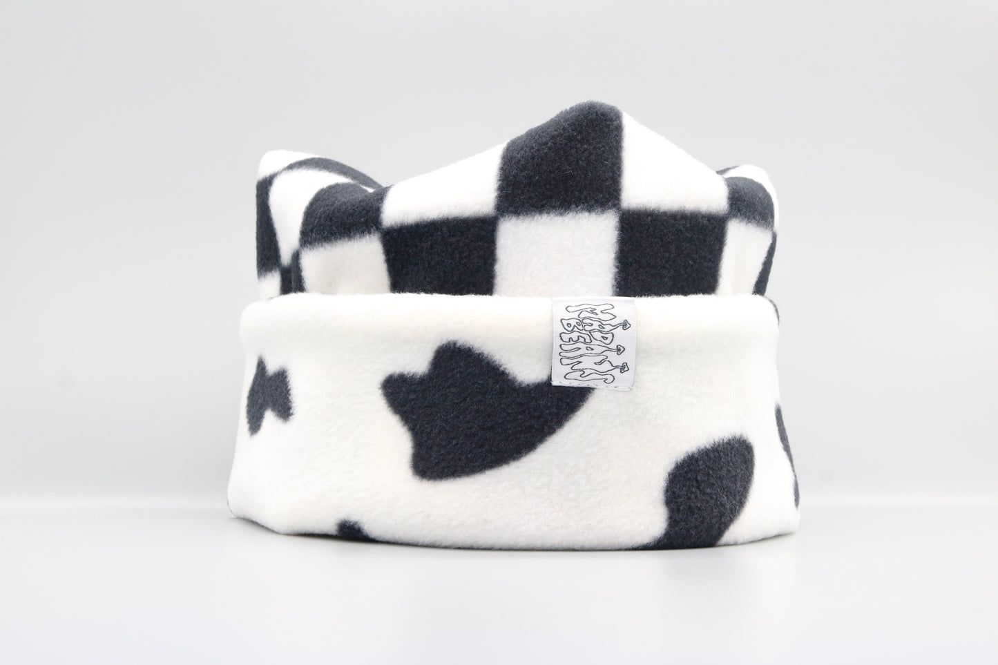 Checkered and Cow