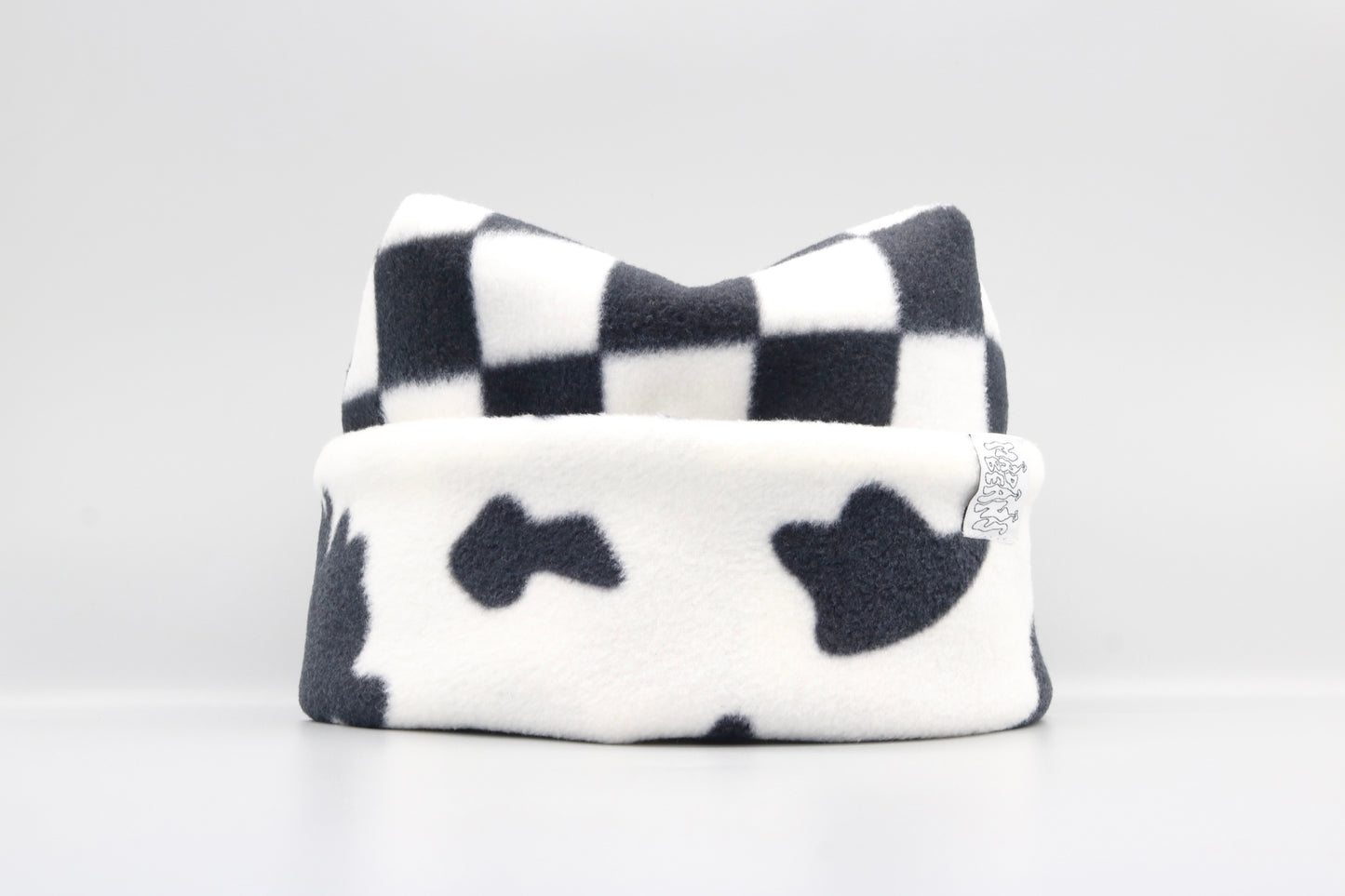 Checkered and Cow